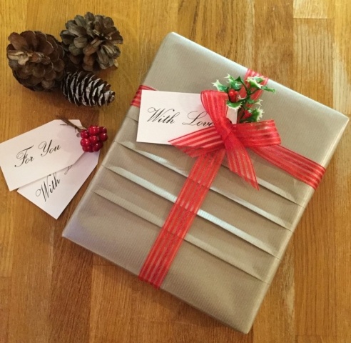 Giftwrapped parcel with pleats in the paper