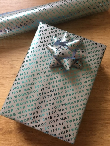 Pretty Gifted foil giftwrap with giftwrapping workshop 19th May printed on it