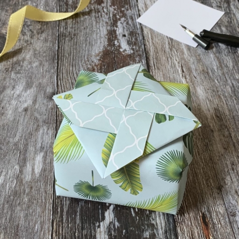 A giftwrapped box with a secret message section