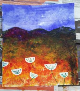 Colourful collagraph print in blues and oranges